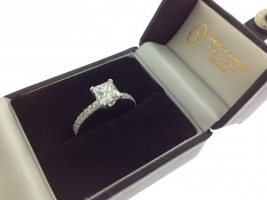 Princes cut engagement ring with diamond band