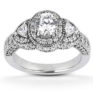 Round brilliant & trillium diamond engagement ring with vintage details