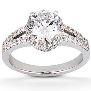 Round brilliant diamond halo engagement ring with diamond split shank