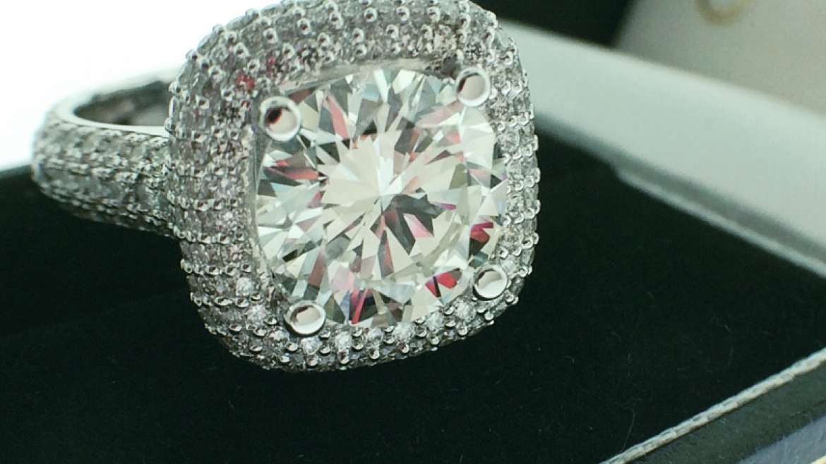 Diamond pave halo engagement ring