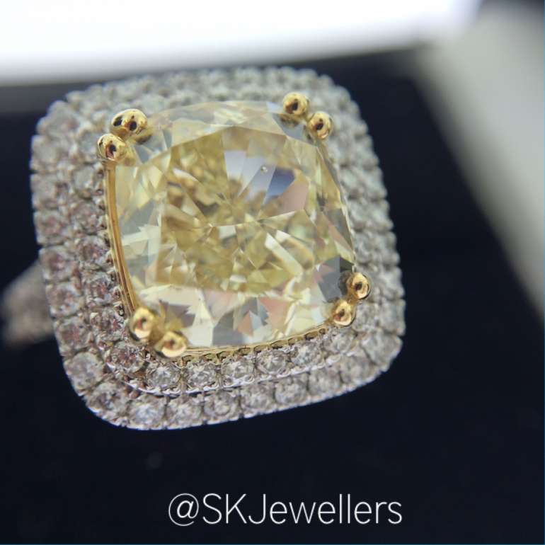 Fancy Yellow cushion cut engagement ring