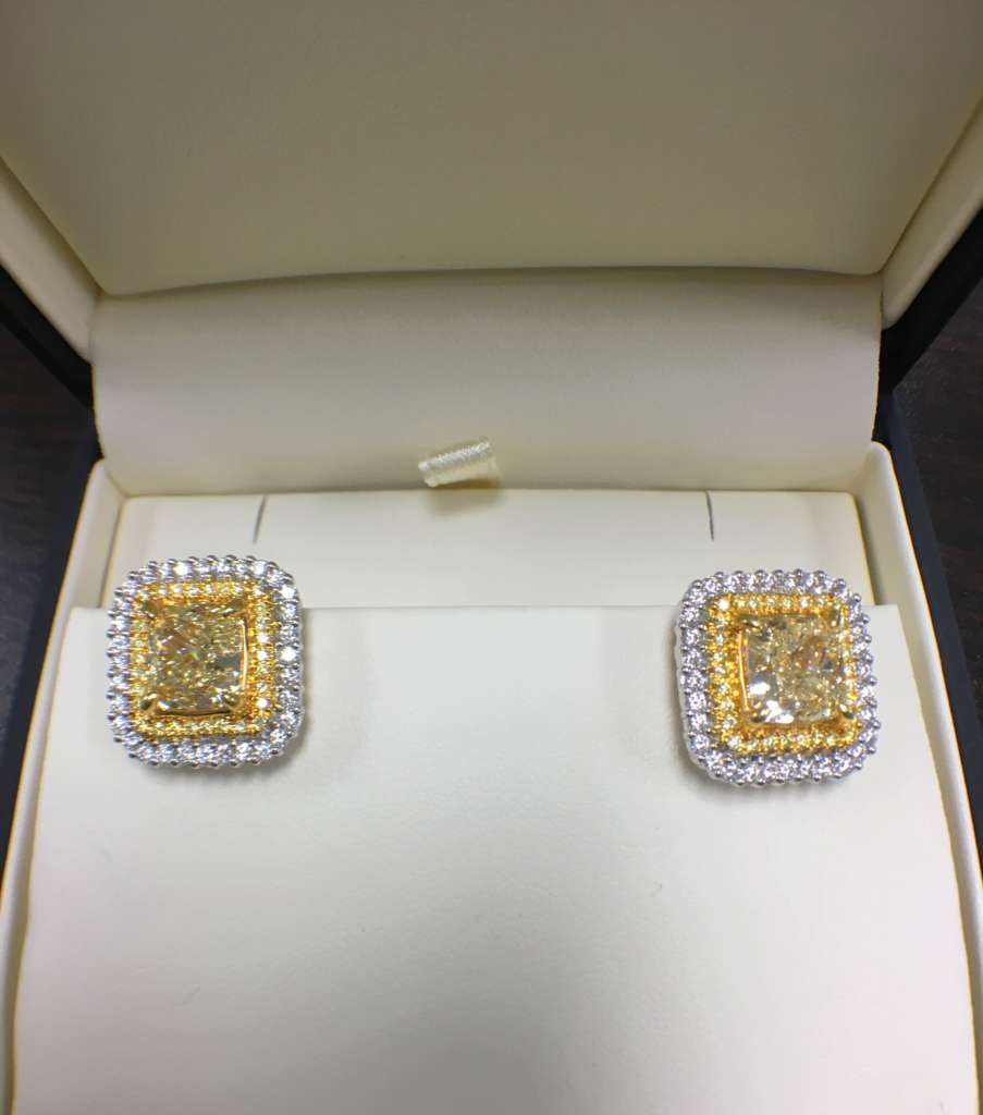 Fancy yellow diamond halo earrings