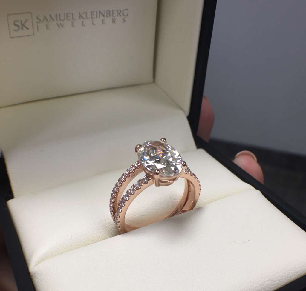 Rose gold oval engagement ring