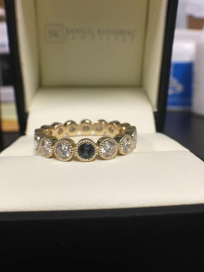 Alexandrite and diamond eternity ring